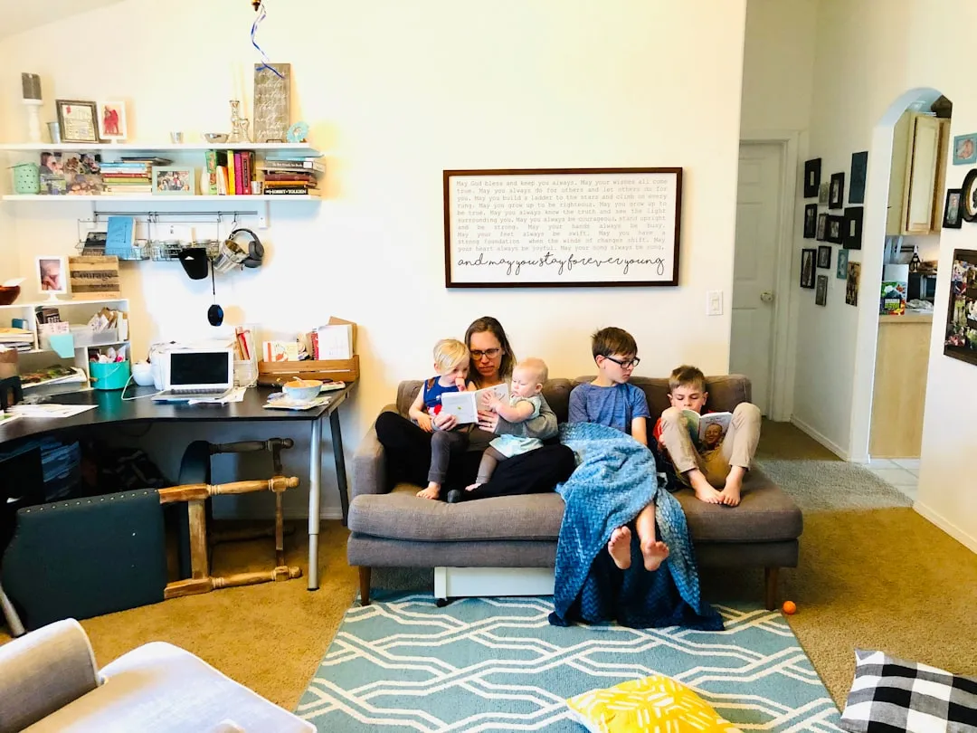 family relaxing in clean living room - air vent cleaning palm coast
