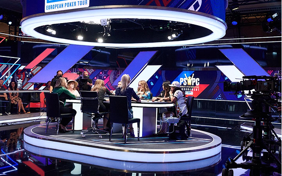 Poker players competing at a professional tournament, illustrating decision making and risk management under pressure