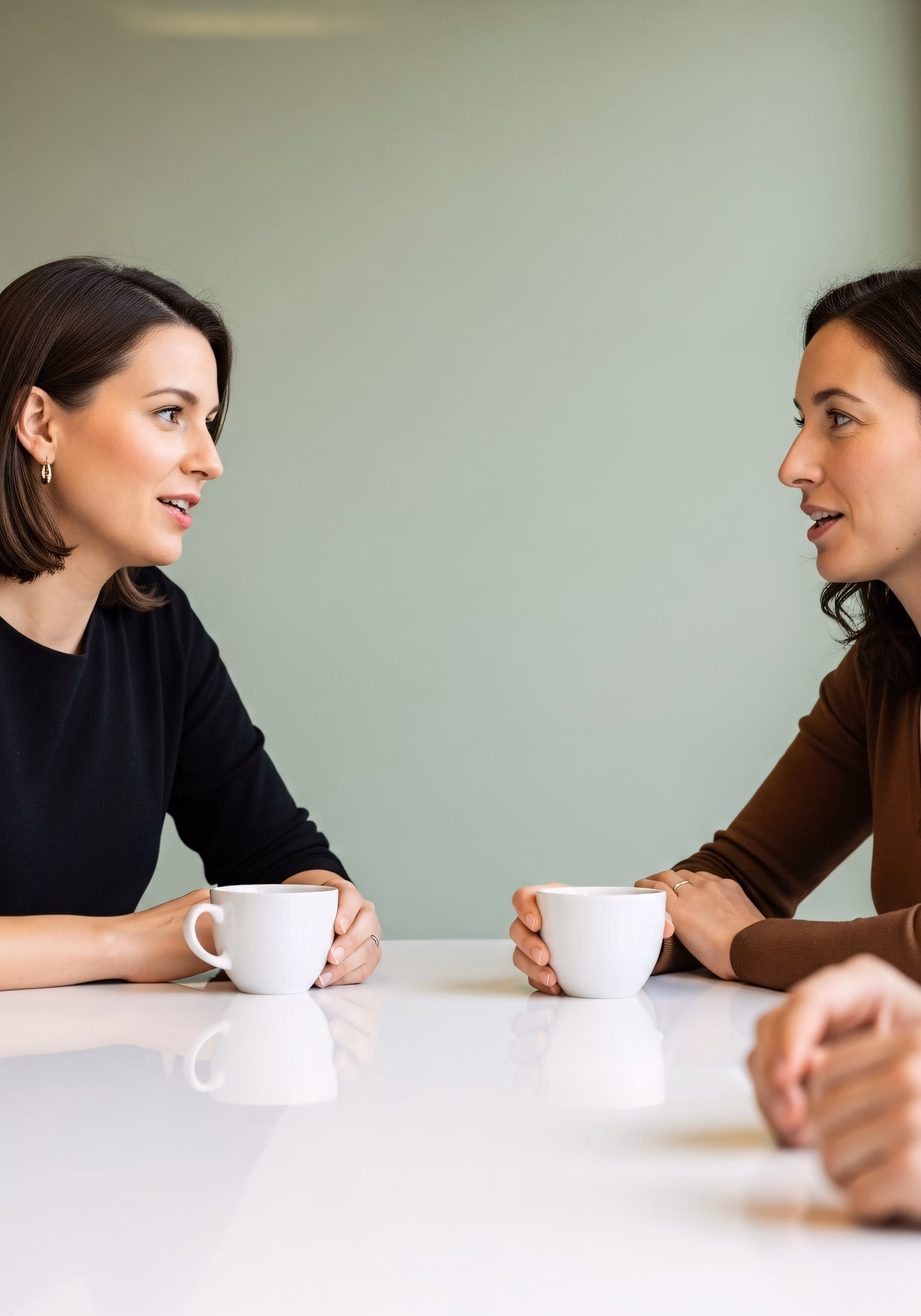 2 ladies drinking tea