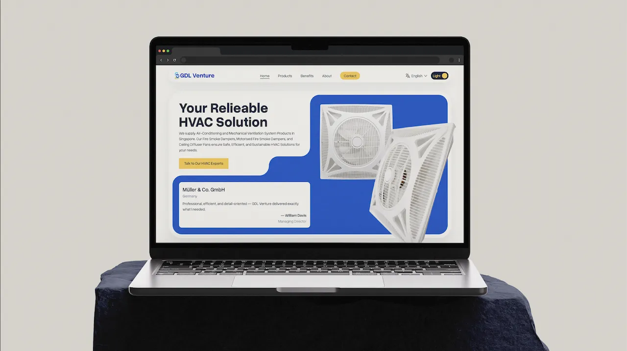 MacBook Pro displaying the 'GDL Venture' homepage, featuring a professional B2B web design with a clean blue color palette, product imagery, and trust-building testimonial cards.