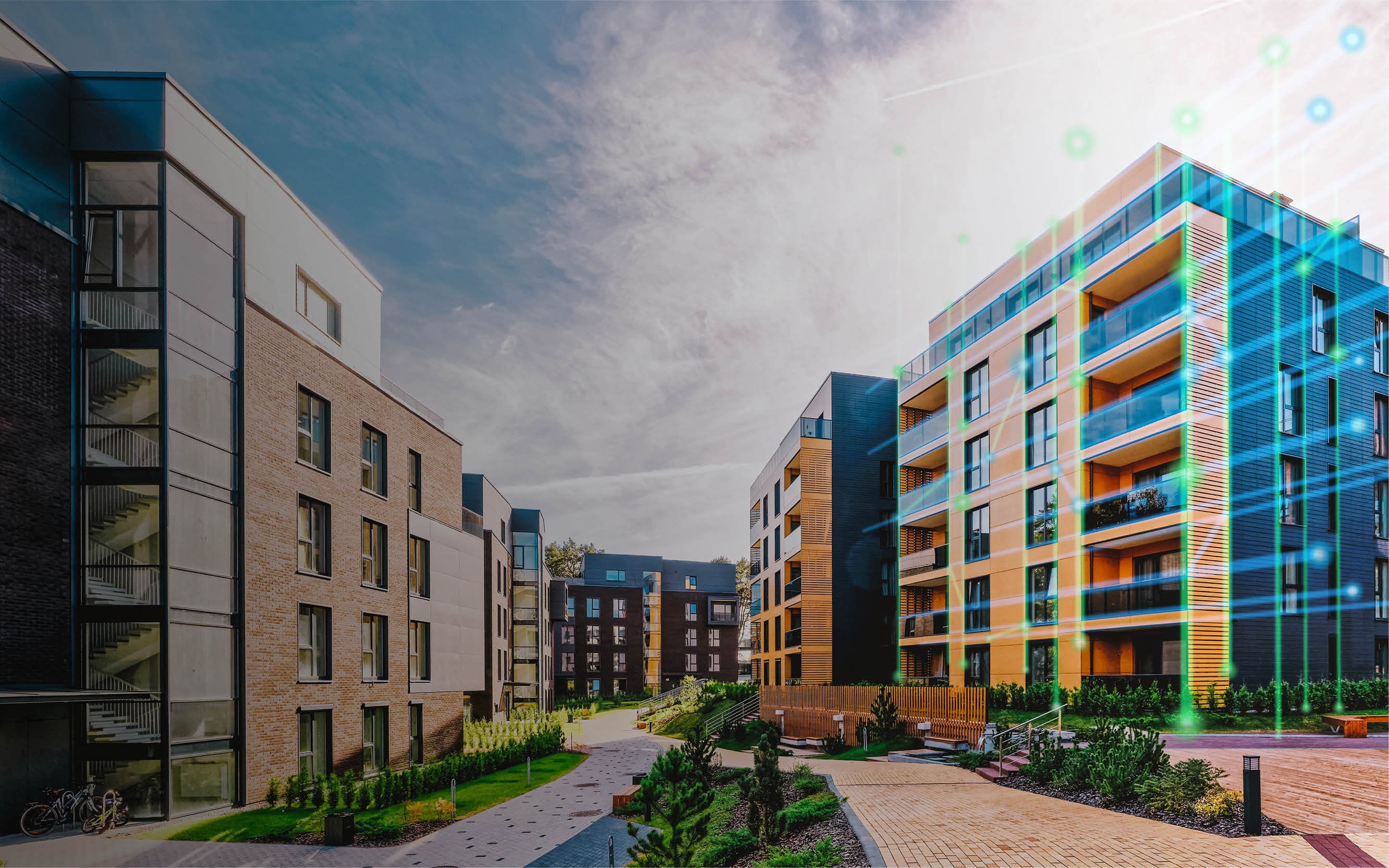 Moderne Wohnhäuser an einem sonnigen Tag mit digital überlagerten Verbindungslinien.