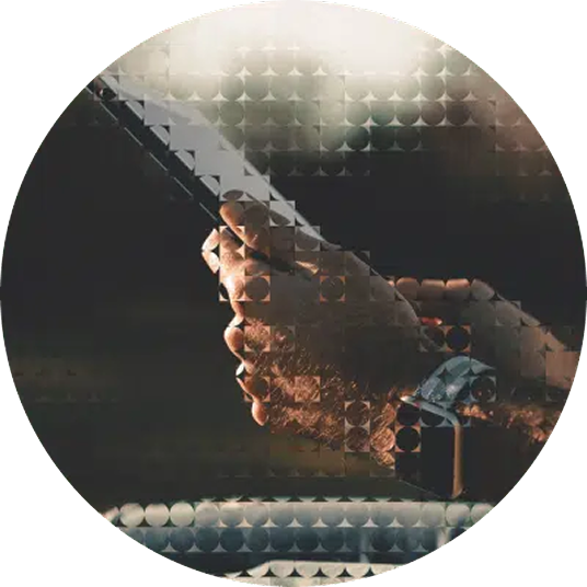 Hand holding a smartphone with a patterned overlay effect.