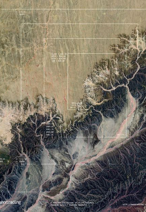 Satellite image showing a rugged mountainous terrain with superimposed white rectangular grid lines and coordinates.