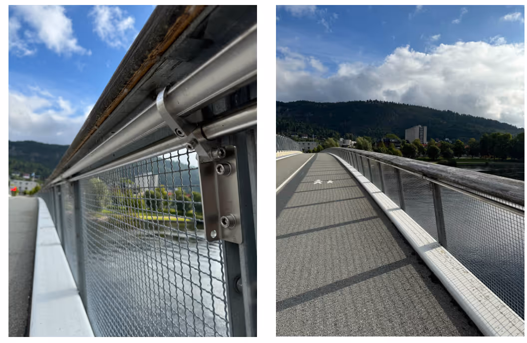 A bridge with a fenceAI-generated content may be incorrect.