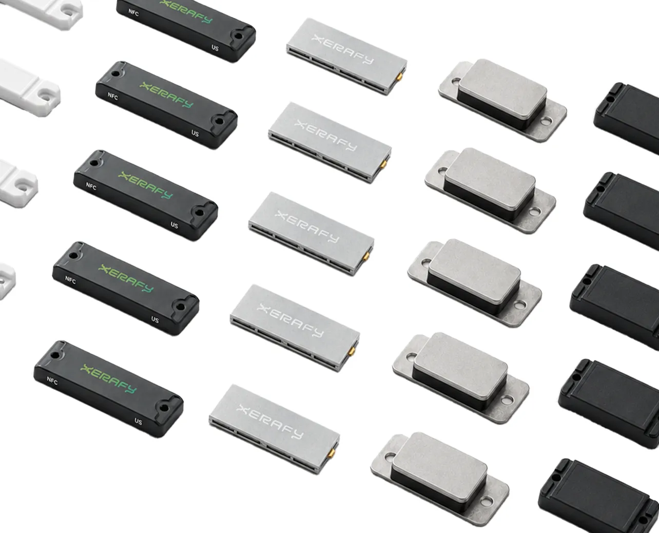 Rows of rectangular electronic tags in black, white, and silver with the brand name Xerafy on some.