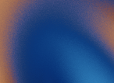 Abstract gradient background blending dark blue and orange colors with soft transitions.