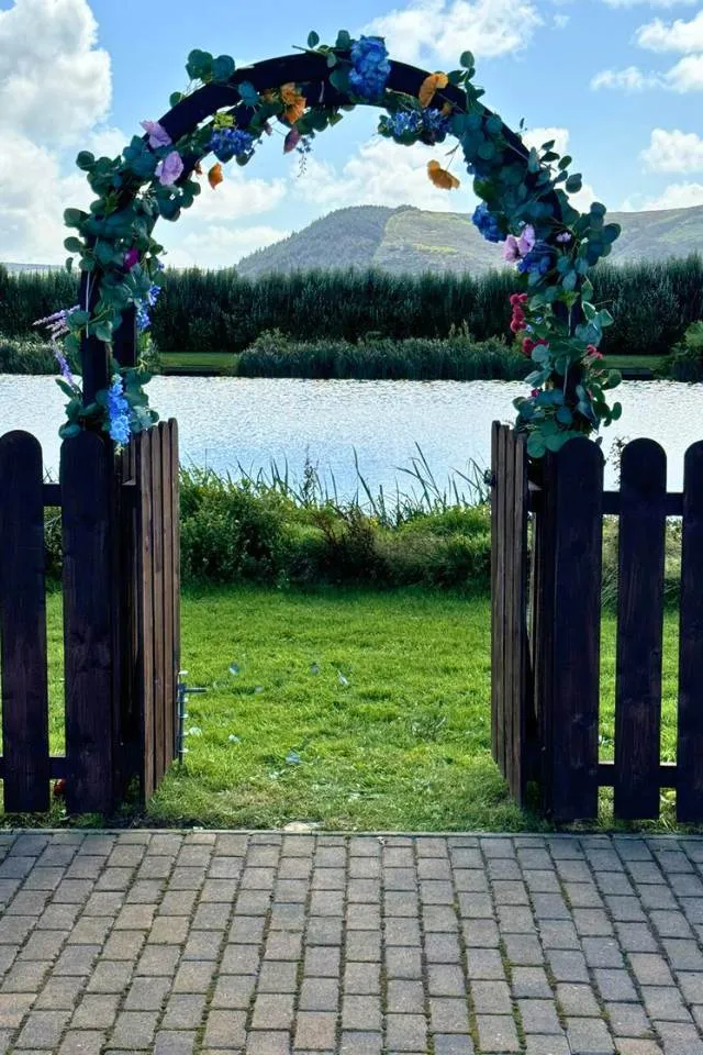 Wedding reception marquee overlooking fishing lakes at Sunset Lakes venue