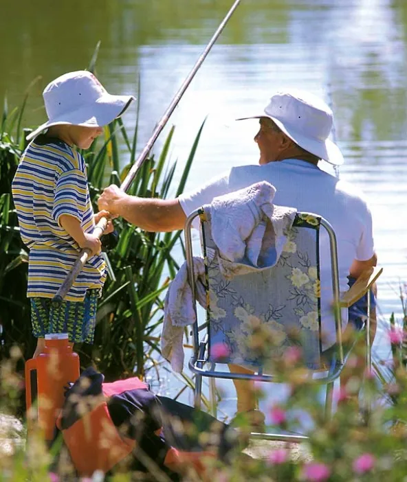 Angler fishing on one of five lakes at Sunset Lakes near Peel