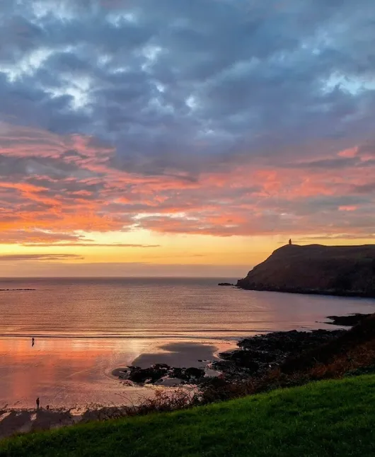 Scenic coastal landscape of Isle of Man with rolling green hills