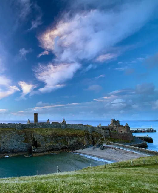 Historic Peel Castle overlooking harbour on Isle of Man
