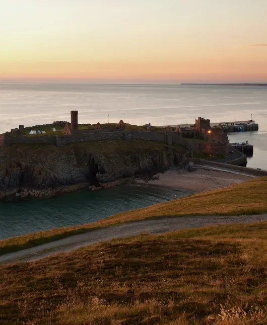 Winding coastal road with sea views on Isle of Man