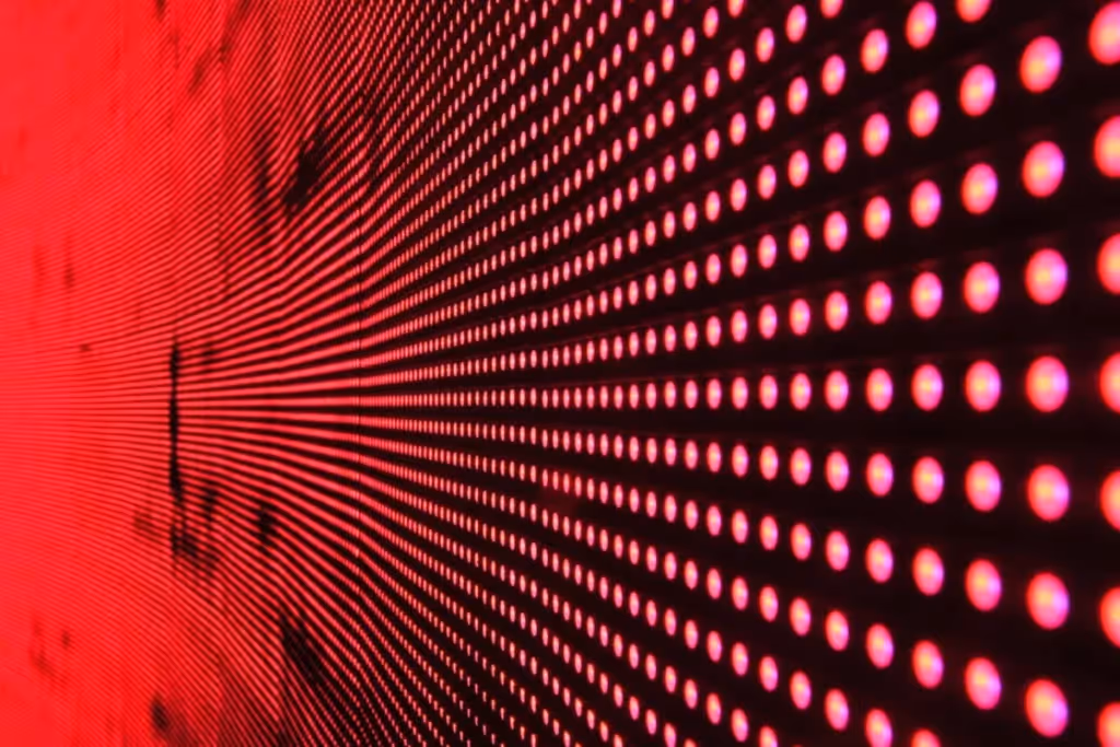Close-up of a red LED light array in a dot matrix pattern.