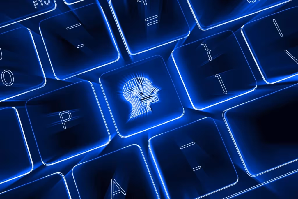 Close-up of a high-tech keyboard with a neon blue key featuring an illuminated human head with circuit design.