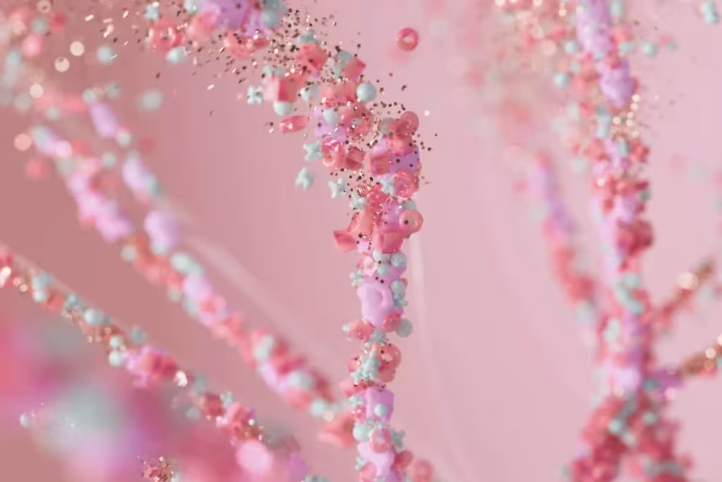 Abstract 3D art of intertwined pastel strands with small pink, blue, and white particles and glitter on a soft pink background.