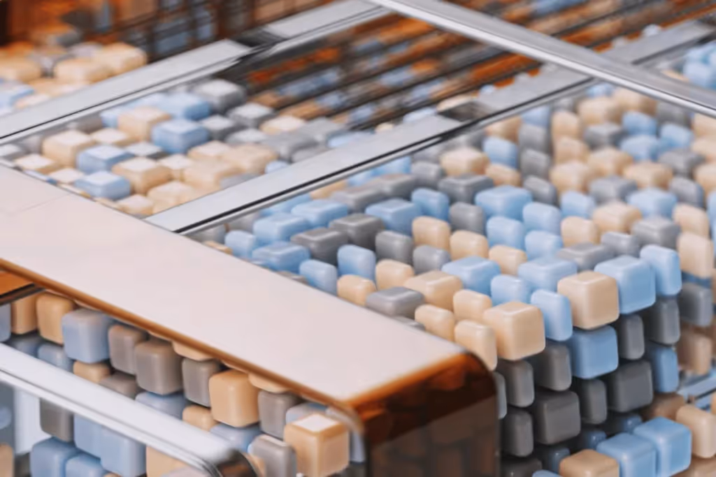 Modern geometric design with blue, beige, and gray cubes in a transparent case.