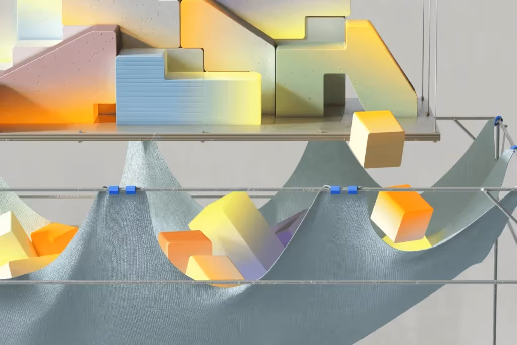 Abstract 3D artwork with pastel-colored geometric blocks and suspended fabric.