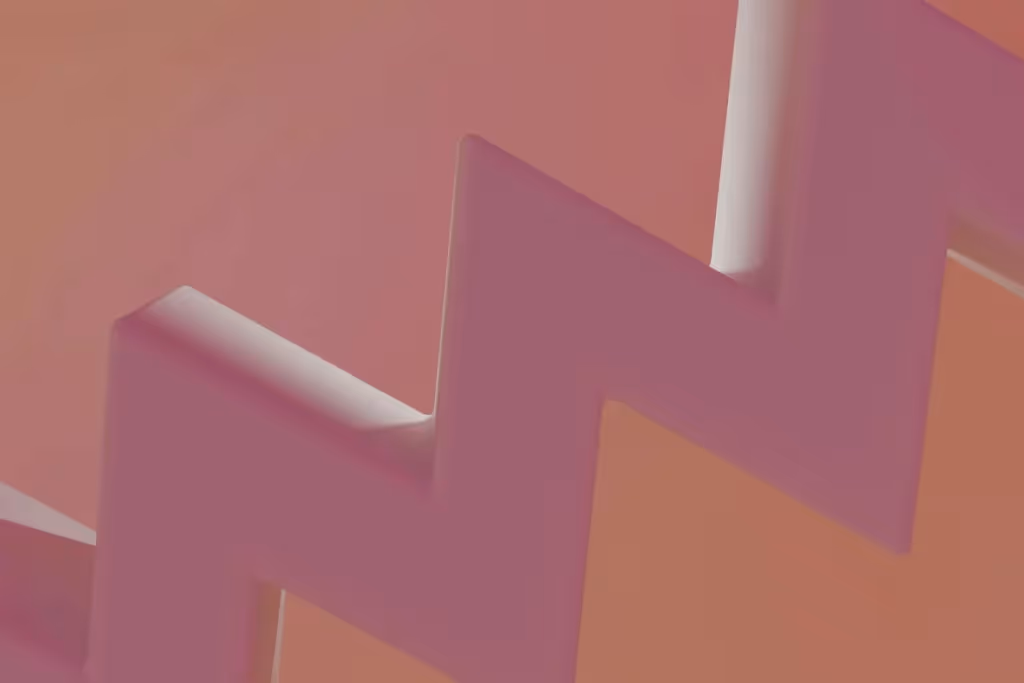 Modern abstract architecture with a stair-like pattern in warm hues.