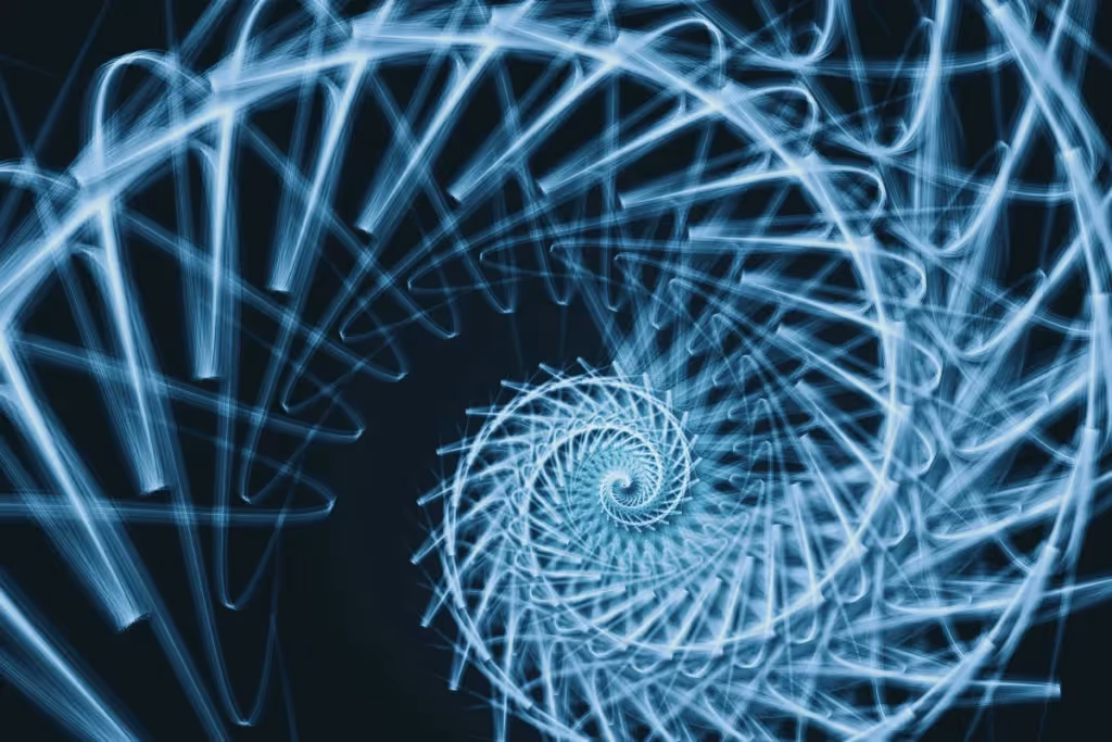 Futuristic blue spiral light pattern on a dark background.