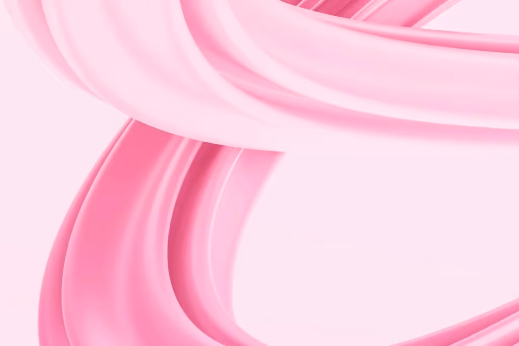 Abstract smooth pink ribbons creating soft curves with glossy textures.