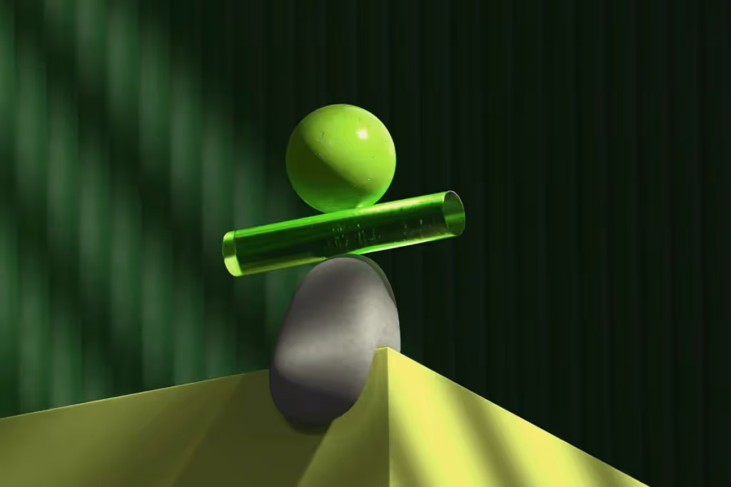 A modern geometric composition with a green sphere, transparent green tube, and a rock on yellow.