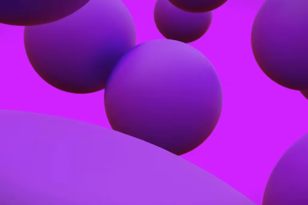 3D rendering of purple spheres in motion over a purple surface.