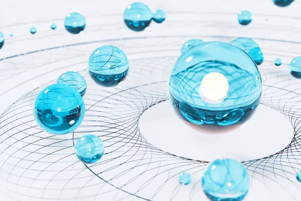 Abstract blue glass spheres floating over a geometric wireframe grid.