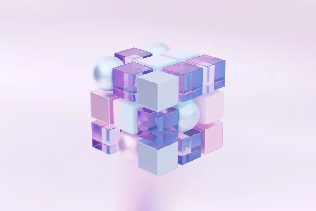 Artistic display of geometric shapes with soft pink and purple tones.
