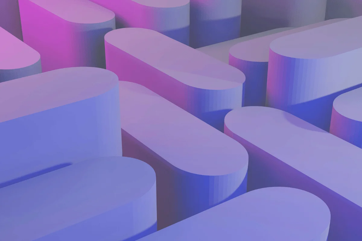 Violet and blue pill-like structures with soft lighting and shadows.