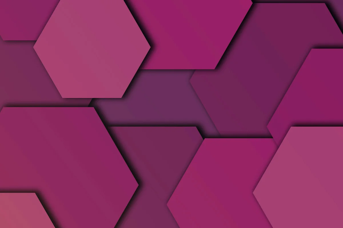 Geometric design with overlapping hexagons in various shades of pink and purple