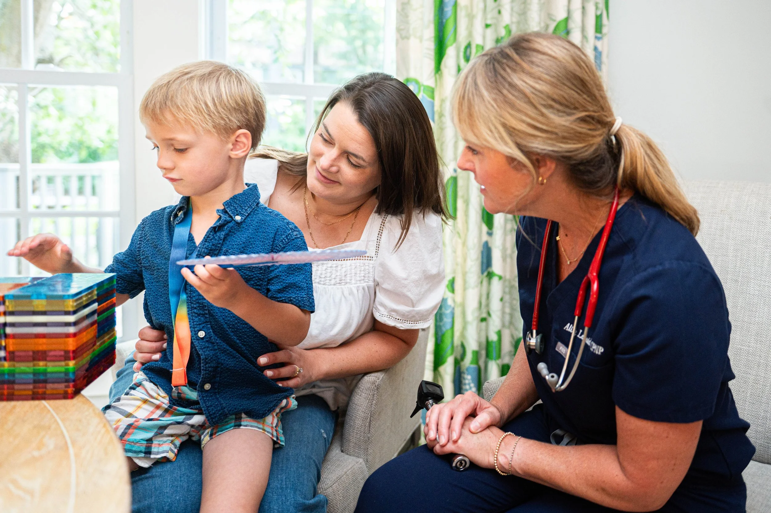 image of parents and staff discussing enrollment