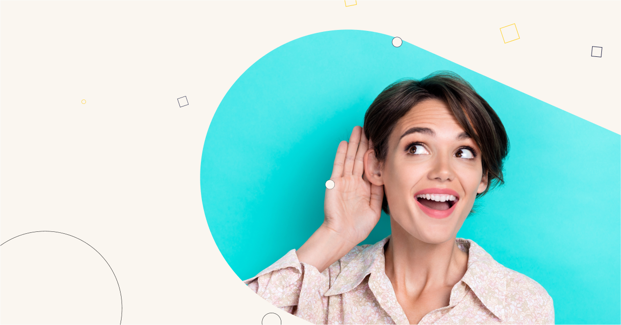 Woman smiling and cupping her ear, as if listening, against a turquoise background.