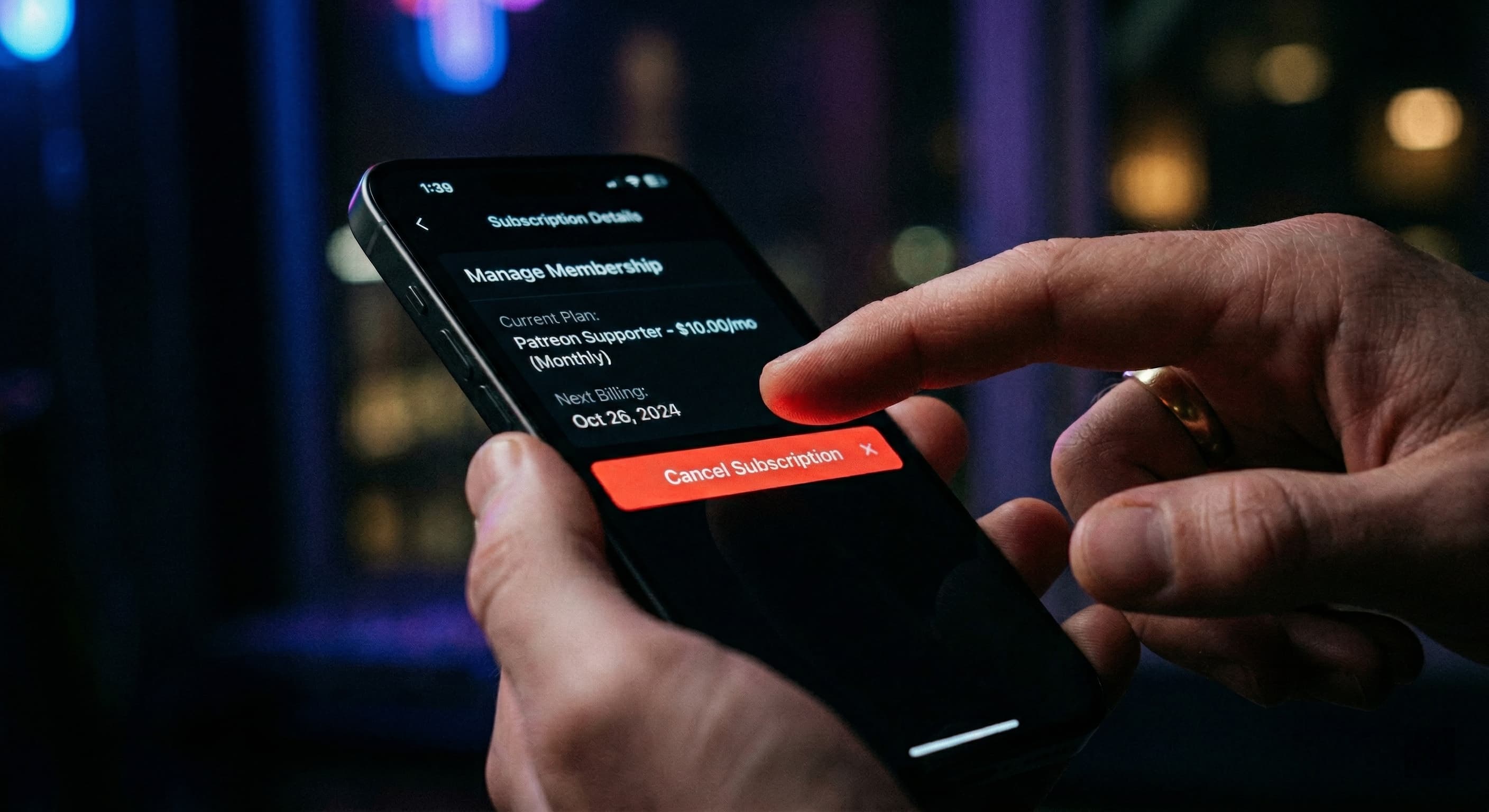 A person cancelling a subscription on a smartphone, representing the process to cancel Patreon.