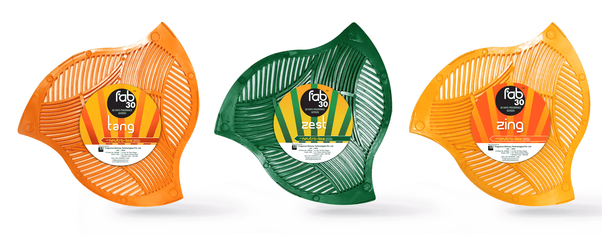 Three colorful leaf-shaped air fresheners in orange, green, and yellow, labeled Tang, Zest, and Zing.