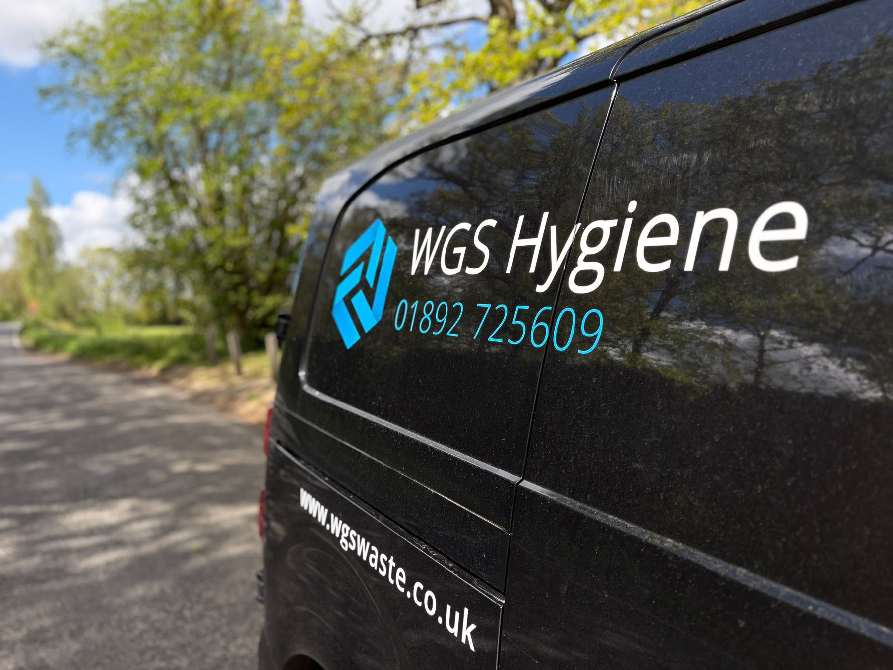 WGS Hygiene service van parked outdoors