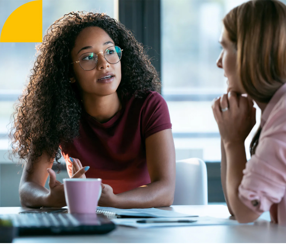 Two women sitting at a table