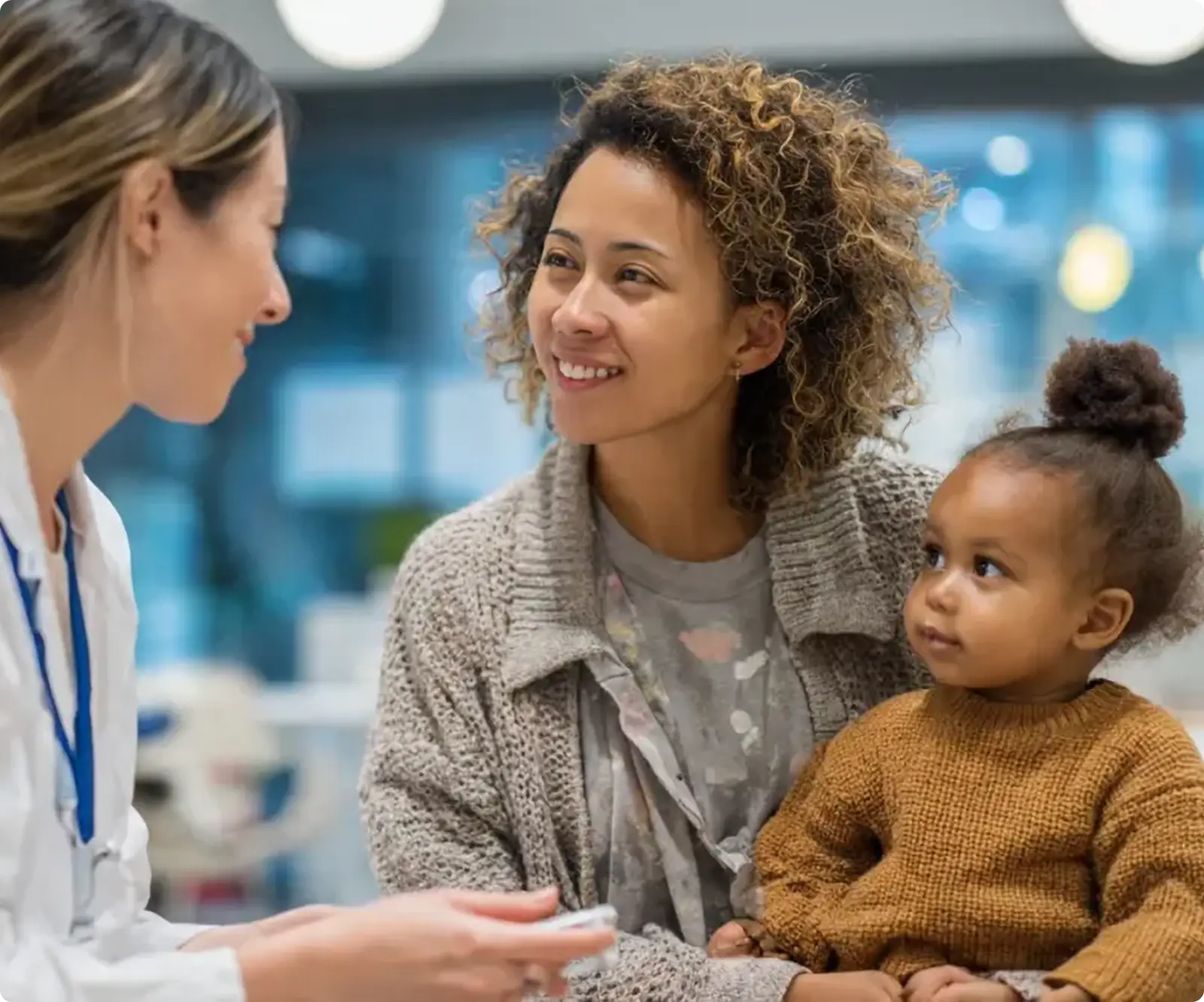 A young child is being examined by a doctor.