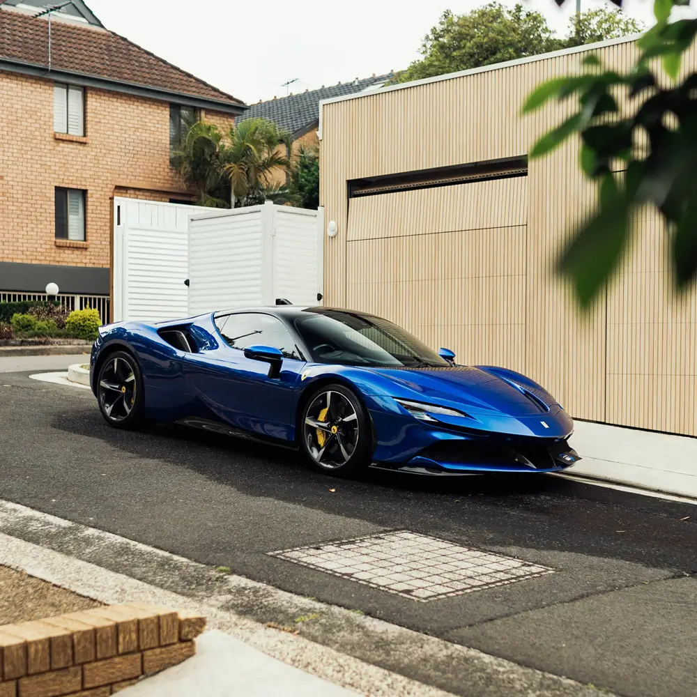 Ferrari parked on the street after a complete exterior car detailing service