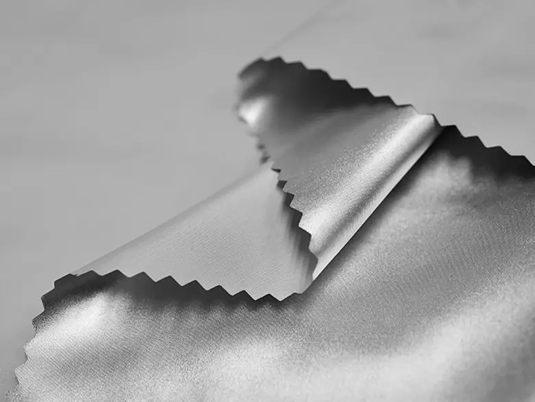XReflex Down Barrier fabric with a silver reflective finish