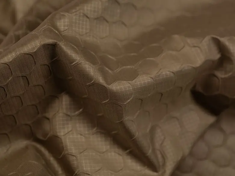 XReflex 3D Woven fabric with an embossed honeycomb pattern