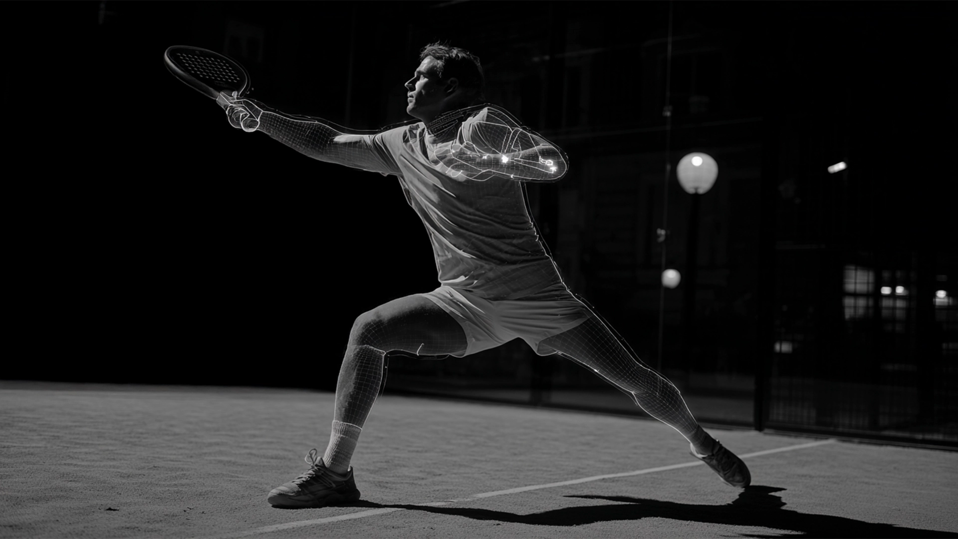 Male tennis player lunging to hit a shot with a tennis racket, with digital wireframe overlays on his arm and leg.