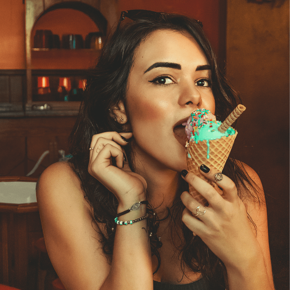 young woman enjoying ice cream
