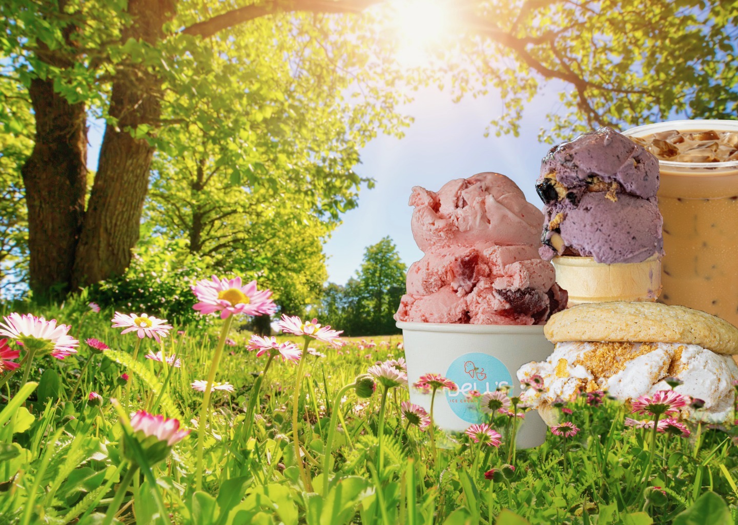 Winter-themed arrangement of Dell's ice cream cups with chocolate and strawberry scoops, iced coffee, caramel sundae, and a sprinkled donut in snow with icicles overhead.