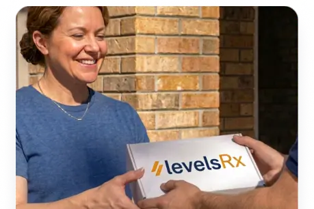 A member receiving a LevelsRx delivery at home
