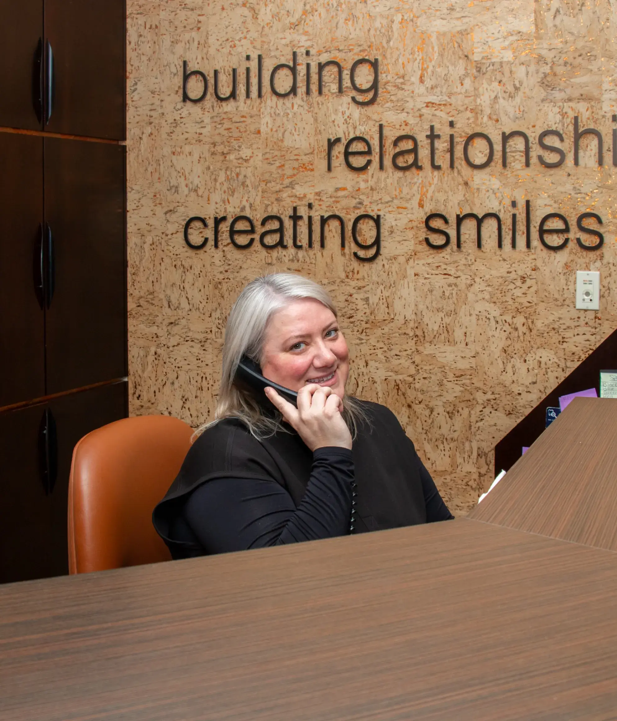 Corner Family Dentistry's team member anwering the phone