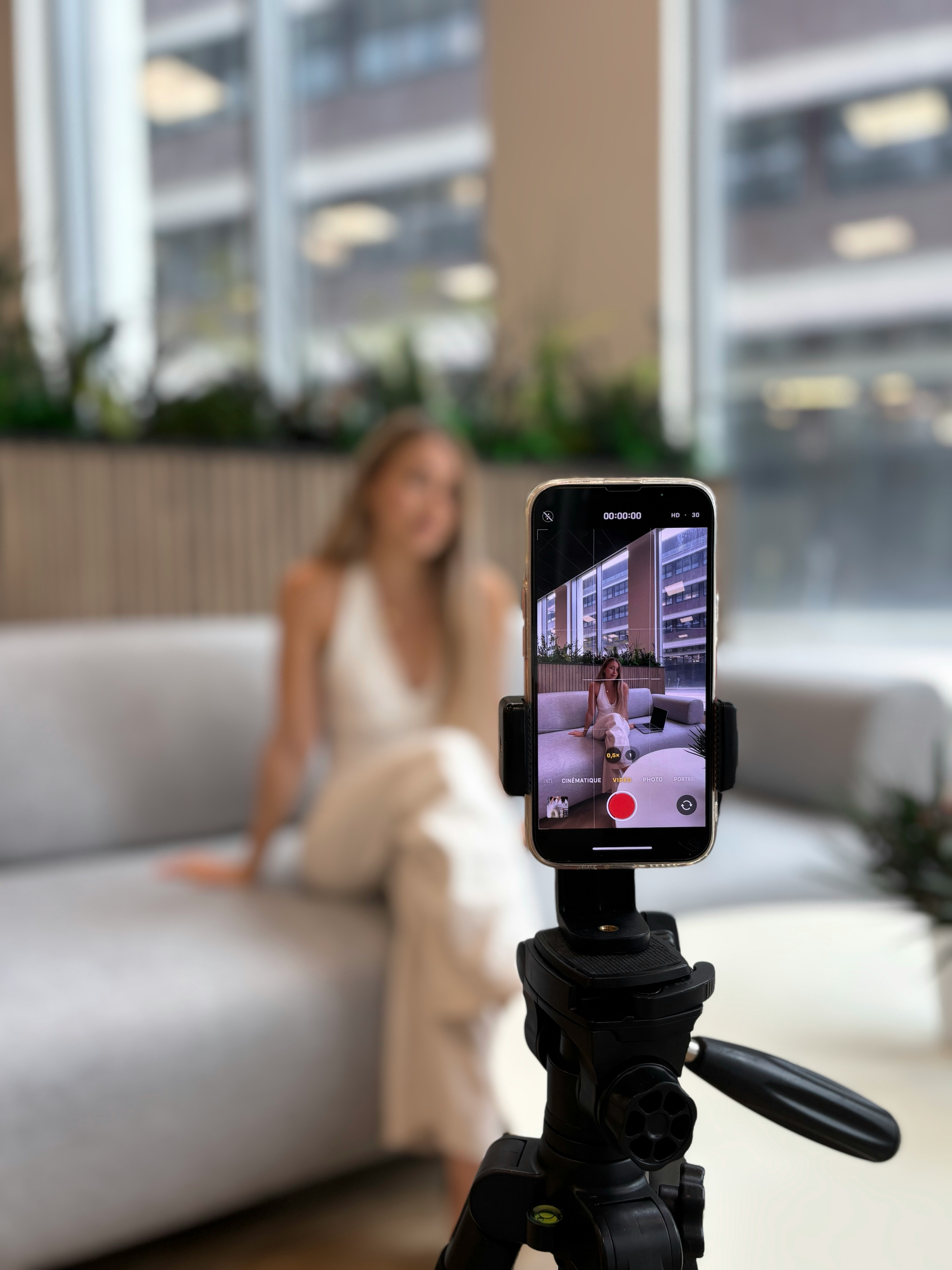 Influencer recording short-form video content on a smartphone