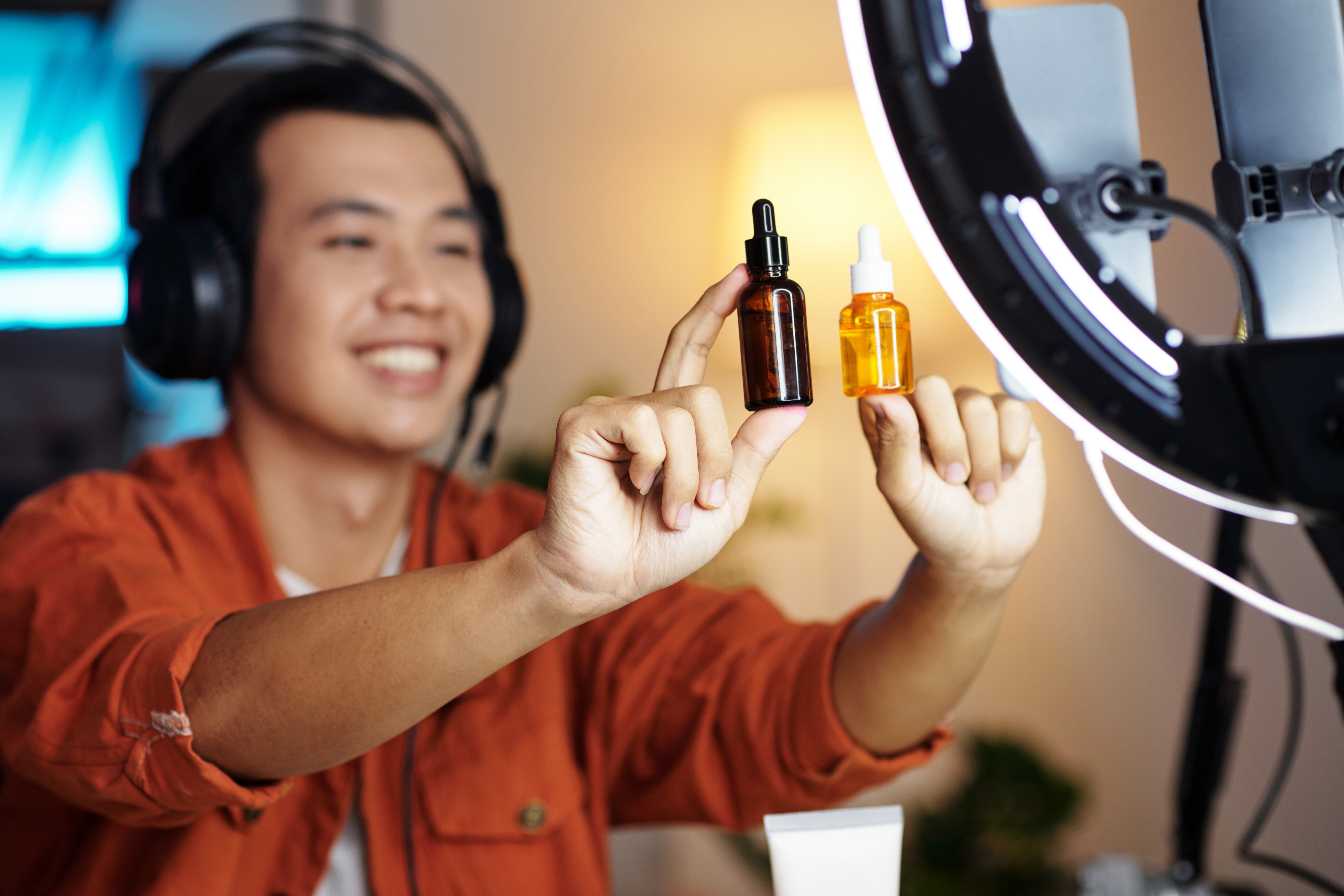 Creator filming a product review with studio lighting
