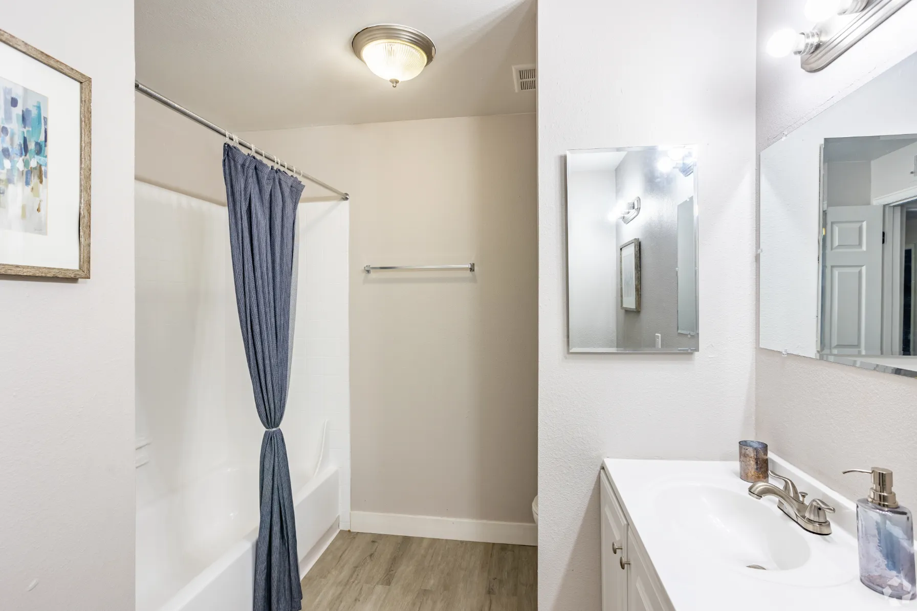 Bathroom with shower with curtain
