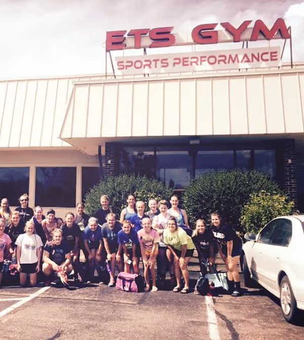 ETS Performance team group photo outside training facility