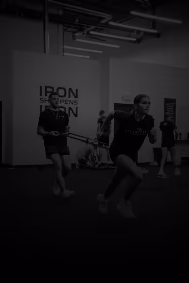 Athletes training together inside ETS Performance gym