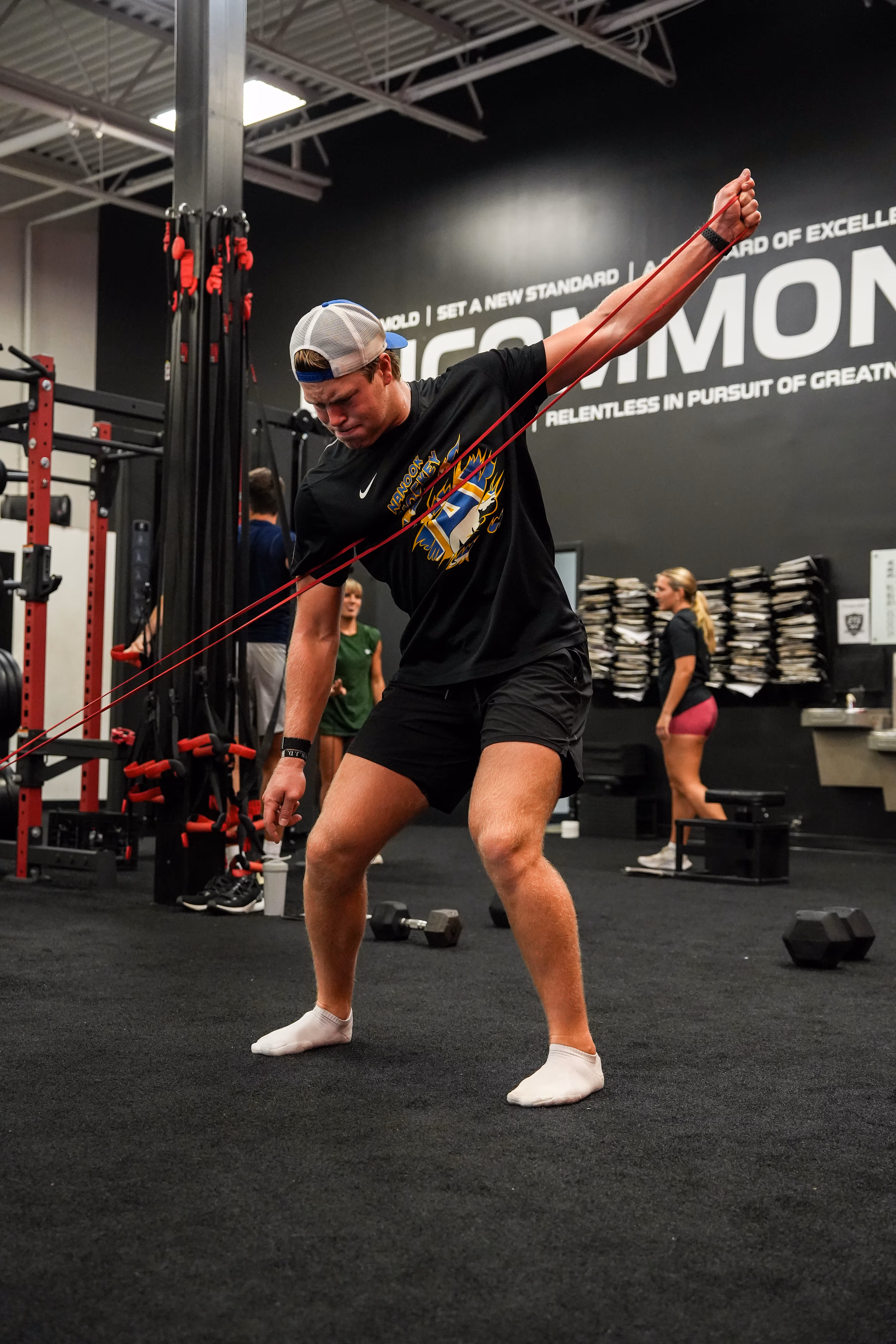 Athlete performing single leg strength exercise at ETS Performance